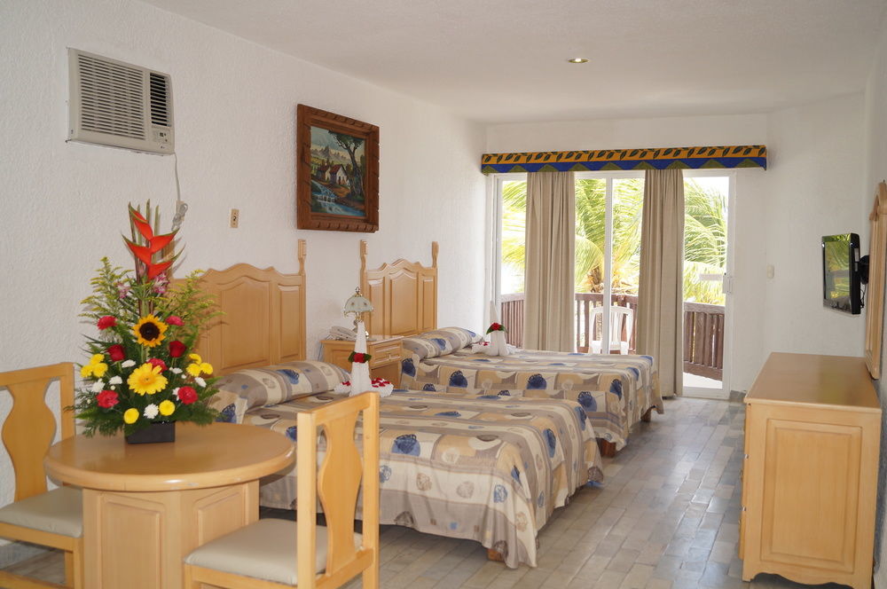 Las Perlas Condos Канкун Экстерьер фото